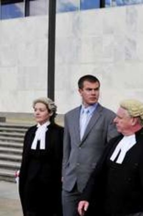 McDonald, second from left, and Deblaquiere, right, leave the ACT Magistrates Court after being found guilty.
