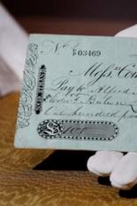 A cheque for 100 pounds signed by Charles Dickens.