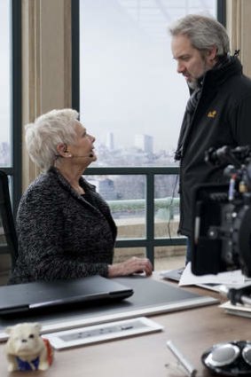 Terrible twist ... Dench on the <i>Skyfall</i> set with director Sam Mendes.