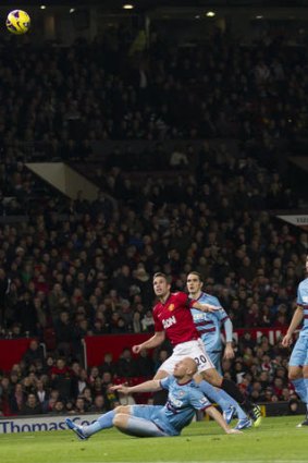 Fast start ... Manchester United's Robin van Persie scores during their English Premier League match against West Ham