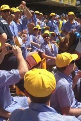 The pig is escorted from the Gabba.