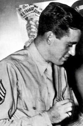In an undated handout photo, JD Salinger as a G.I. in 1943.
