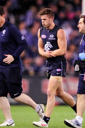 Carlton's Marc Murphy comes off injured in round eight.