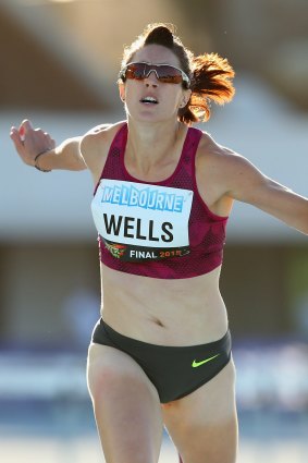 Canberra hurdler Lauren Wells has run her season best time just weeks before the world championships in Beijing.
