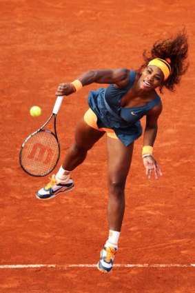 Smash and grab: Serena Williams continued her top form at the French Open with an easy secon-round win.