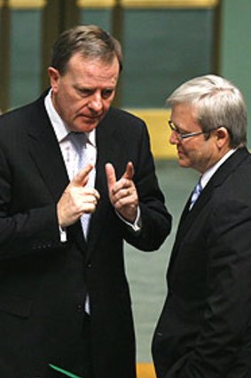 Peter Costello with Prime Minister Kevin Rudd. The former treasurer yesterday announced his departure from politics.