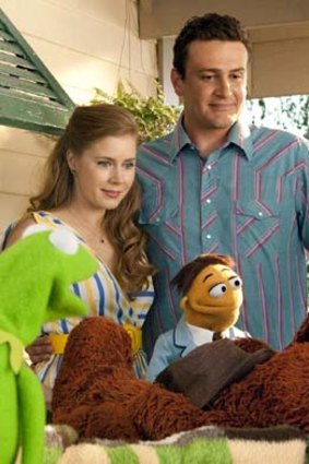 Amy Adams and Jason Segel in <em>The Muppets</em>.