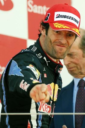 Victor ... Mark Webber on the podium at Silverstone in July.