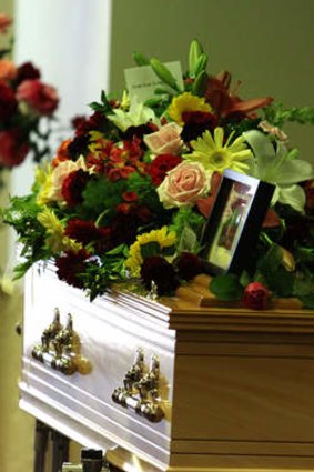 GATTON, AUSTRALIA - JANUARY 20: Flowers cover the coffins at the funeral of Noelene and Yvana Bischoff at the Gatton Baptist church.