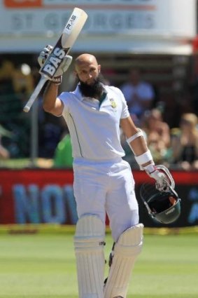 Hashim Amla acknowledges the applause after reaching a century in the second Test against Australia earlier this year.