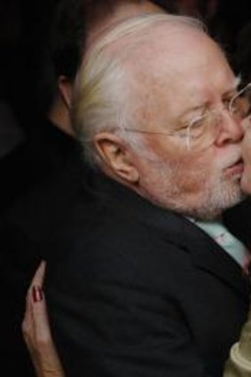 The Mills sisters were raised with celebrities. Here, Juliet  kisses Sir Richard Attenborough at the memorial service for her father Sir John in 2005.