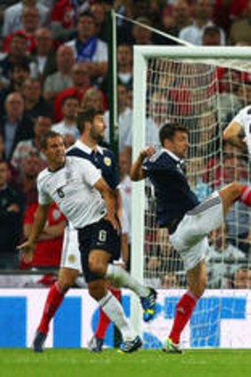 England's Rickie Lambert scores the winning goal against Scotland.