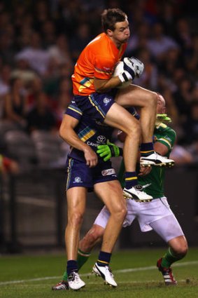Hawthorne defender and Australian Goalkeeper Matt Suckling Australia gathers the ball during game one of the International Rules Series against Ireland.