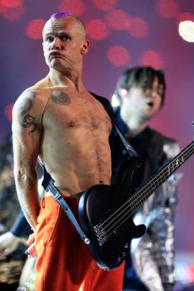 Look, no hands or plugs! ... Flea admits freely that the Red Hot Chili Peppers played air guitar at Super Bowl.
