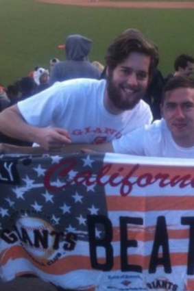 Sean Reid, pictured right, doesn't just limit himself to Australian sport: here he is at a US baseball game in 2013.