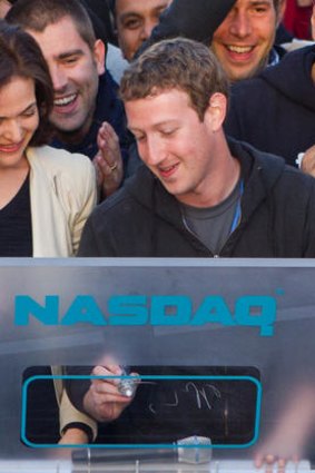 Ring-a-ding: Mark Zuckerberg rings the Nasdaq opening bell.