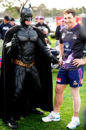 Superheroes: Billy Slater with Batman yesterday.