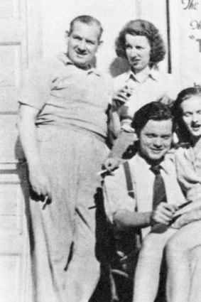 Bill Herz, second from the right, with cast and crew members of Too Much Johnson in 1938 with Orson Welles, seated.
