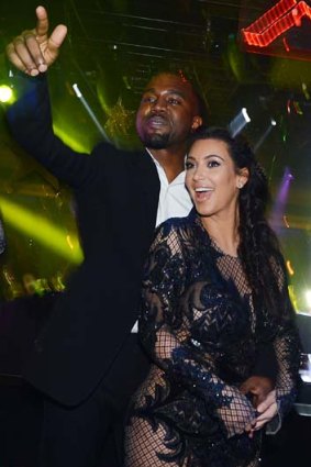 Parents-to-be ... Kanye West and Kim Kardashian celebrate New Year's Eve at 1OAK nightclub in Las Vegas.