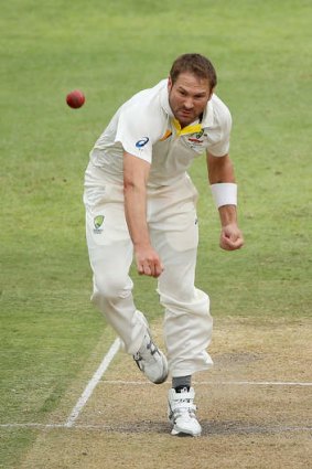 Gritting his teeth, Australia's Ryan Harris, bowls in South Africa.