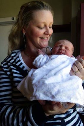 28 minutes difference: Baby Warwick Neylan with mum Beatrice.