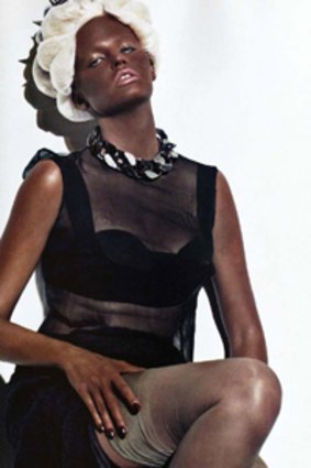 Dutch model Lara Stone painted black for French <i>Vogue</i> magazine.