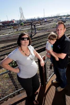 Railway Place residents Meredith and Richard Goss with their son Dylan.