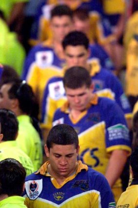 Cayless leads the defeated Eels team back to the dressing room after losing the 2001 grand final.