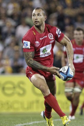 Ewen McKenzie has hailed the Reds' Quade Cooper, pictured, as a "key game caller".