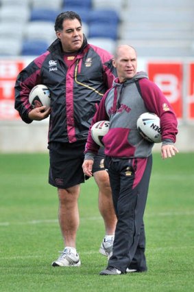 Mal Meninga and Alfie Langer watch on during a Maroons training session  in Geelong last year.