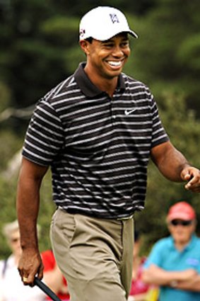 Tiger Woods enjoys the casual air of yesterday’s pro-am event at Victoria.