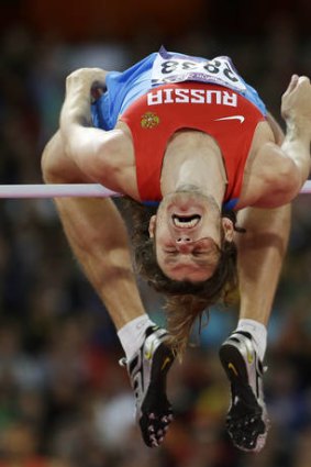 Russia's Ivan Ukhov clears the bar in the men's high jump final.