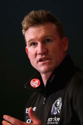 Nathan Buckley addresses the media.