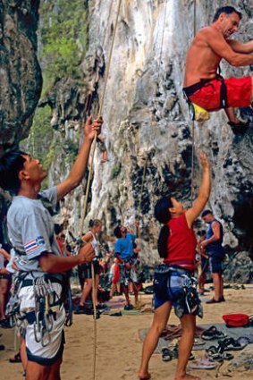 On the up: climbers at Railay Beach in Krabi.