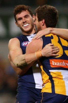 Luke Shuey and Patrick McGinnity of the Eagles celebrate a goal during the round 22 AFL match between the West Coast Eagles and the Melbourne Demons at Patersons Stadium.