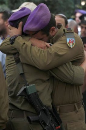 Mourners at the funeral of Lieutenant Hadar Goldin, killed in Gaza.