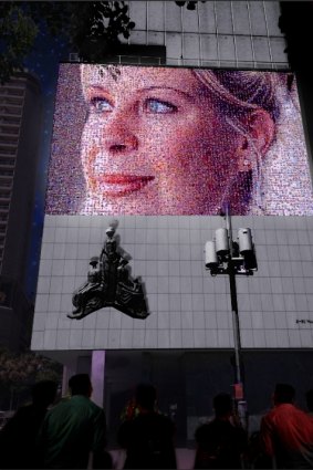 A render of a planned installation at the Vivid festival featuring Jane McGrath and photographs of thousands of Australians touched by breast cancer. 