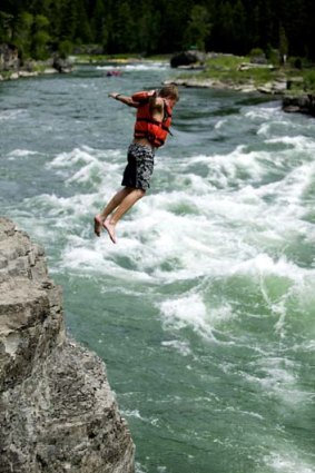 Taking a risky river plunge.