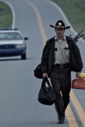 Andrew Lincoln plays small-town sheriff's deputy Rick Grimes, a man who emerges from a coma to find that most of the population have become the walking dead.