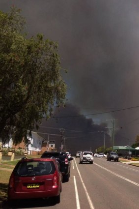 A large bush fire burning in the area around Racecourse Road at Cessnock. 