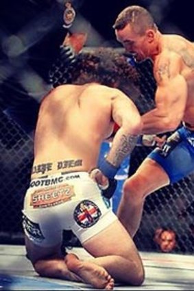 Kyle Noke (right) moves in for the kill against Charlie Brenneman at UFC 152. Photo posted on Instagram (http://instagram.com/p/P6xWXrJ5-j/).