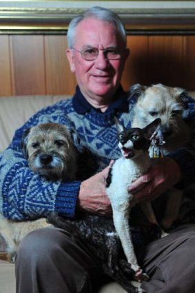 Hugh Wirth at home with his dogs, Lachlan and Miss Lexie and cat Molly.