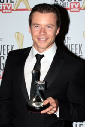Todd Lasance shows off his Silver Logie.
