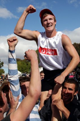 Cut above the rest: Matt Wiltshire celebrates after his Stawell Gift win.