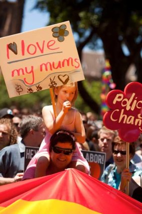 Michele Saffery and her daughter, Gemma, 6, join the gay marriage rights march in Sydney yesterday.