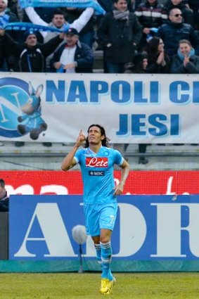 Napoli's Edinson Cavani celebrates after scoring against Parma.
