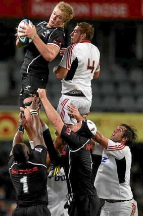 Pieter-Steph du Toit of the Sharks wins a line-out ahead of Luke Romano of the Crusaders.
