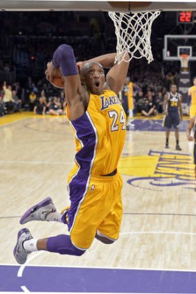 Injured LA Lakers star Kobe Bryant has re-signed with the club for another two years.