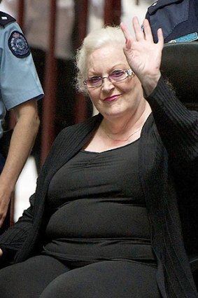 Judy Moran gives a last wave to the media after being found guilty of murdering her brother-in-law Des ''Tuppence'' Moran.