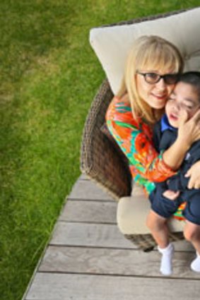 Robyn Reynolds with her foster child Ethan, 6.